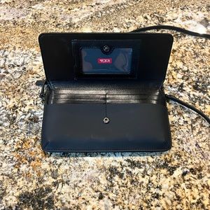 Brand New Black Tumi Clutch